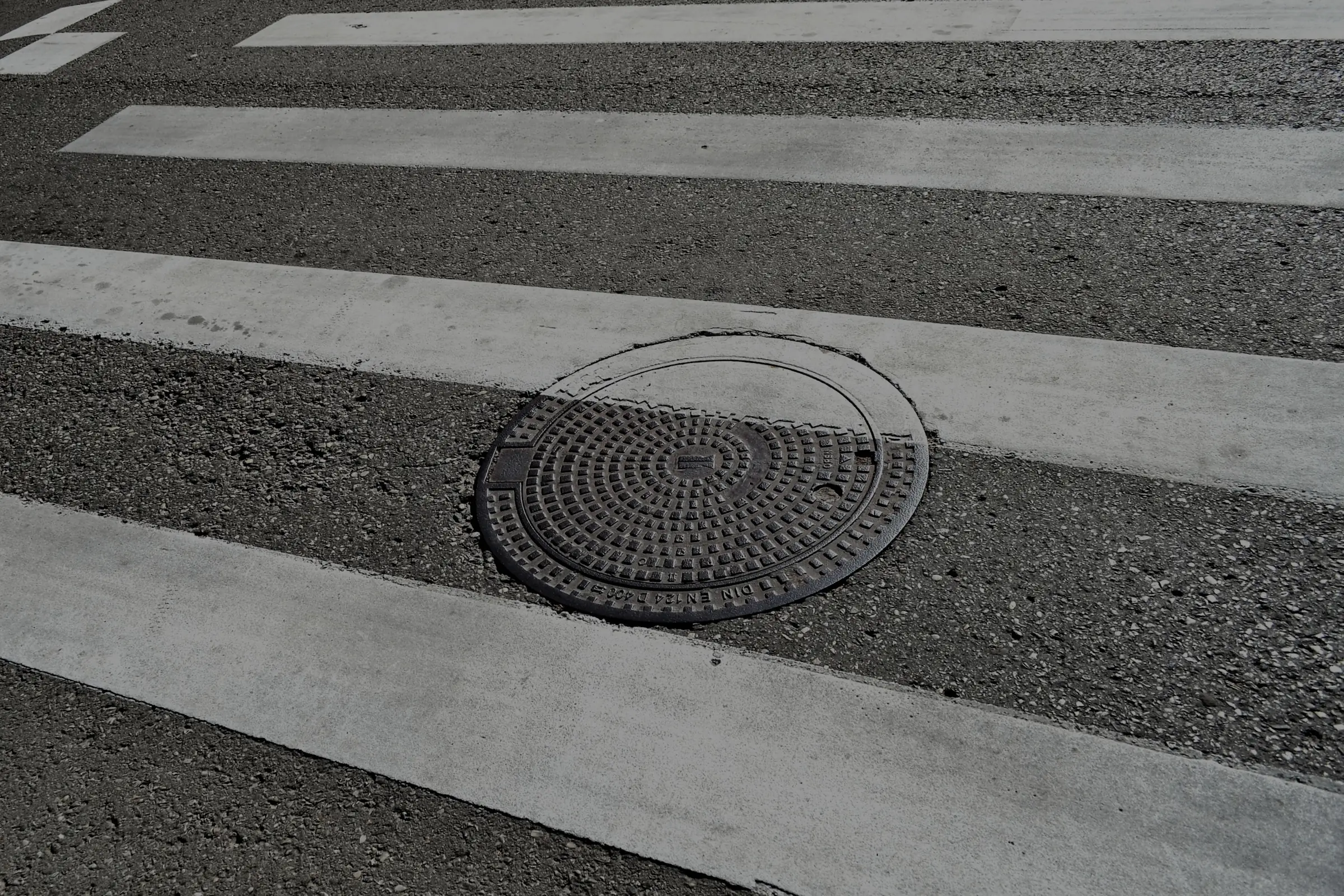 Marcus Gustafsson settled for $18 million after he fell into an open manhole and a jury awarded him $85 million.